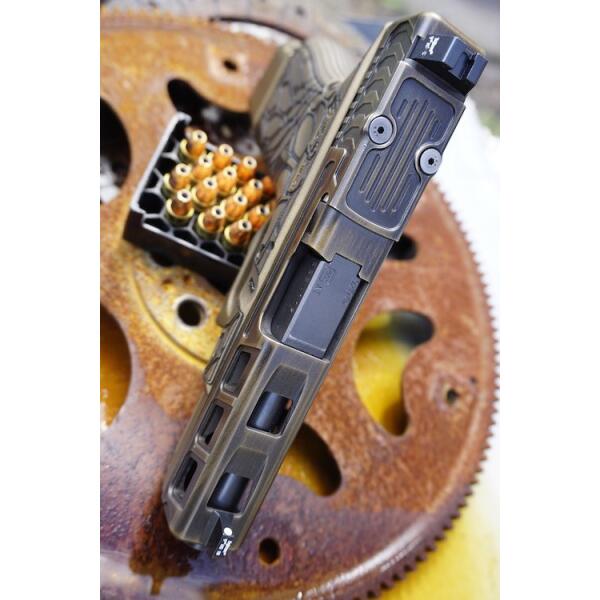 top view of tan glock handgun